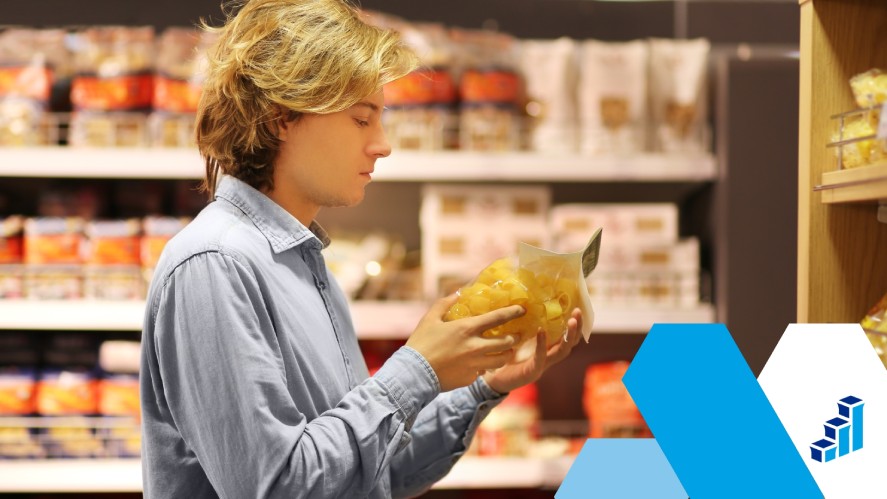 A customer is trying and touching a product before purchasing